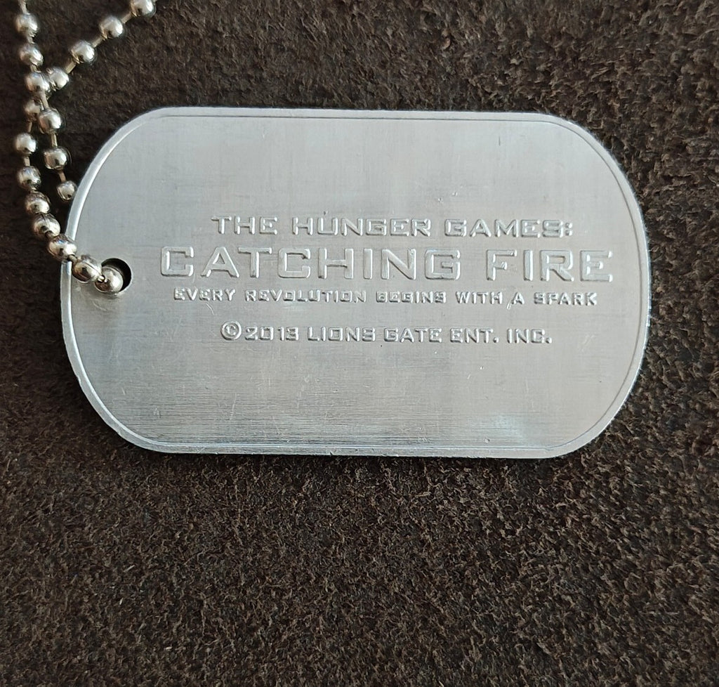 Promotional "The Hunger Games: Catching Fire" District 12 Victor Dog Tag