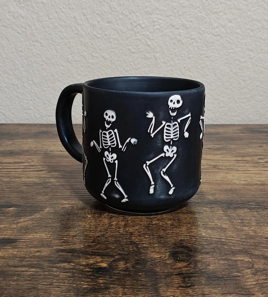 Dancing Skeletons Black Earthenware 13 oz 3D Embossed Black Mug.
