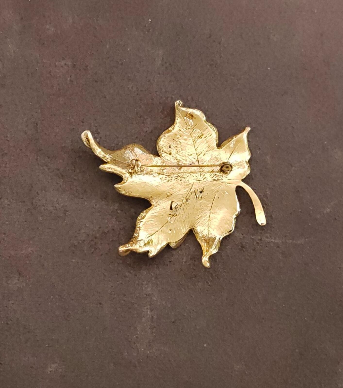 1980s Gold Tone Maple Leaf With Multi Colored Rhinestones Brooch