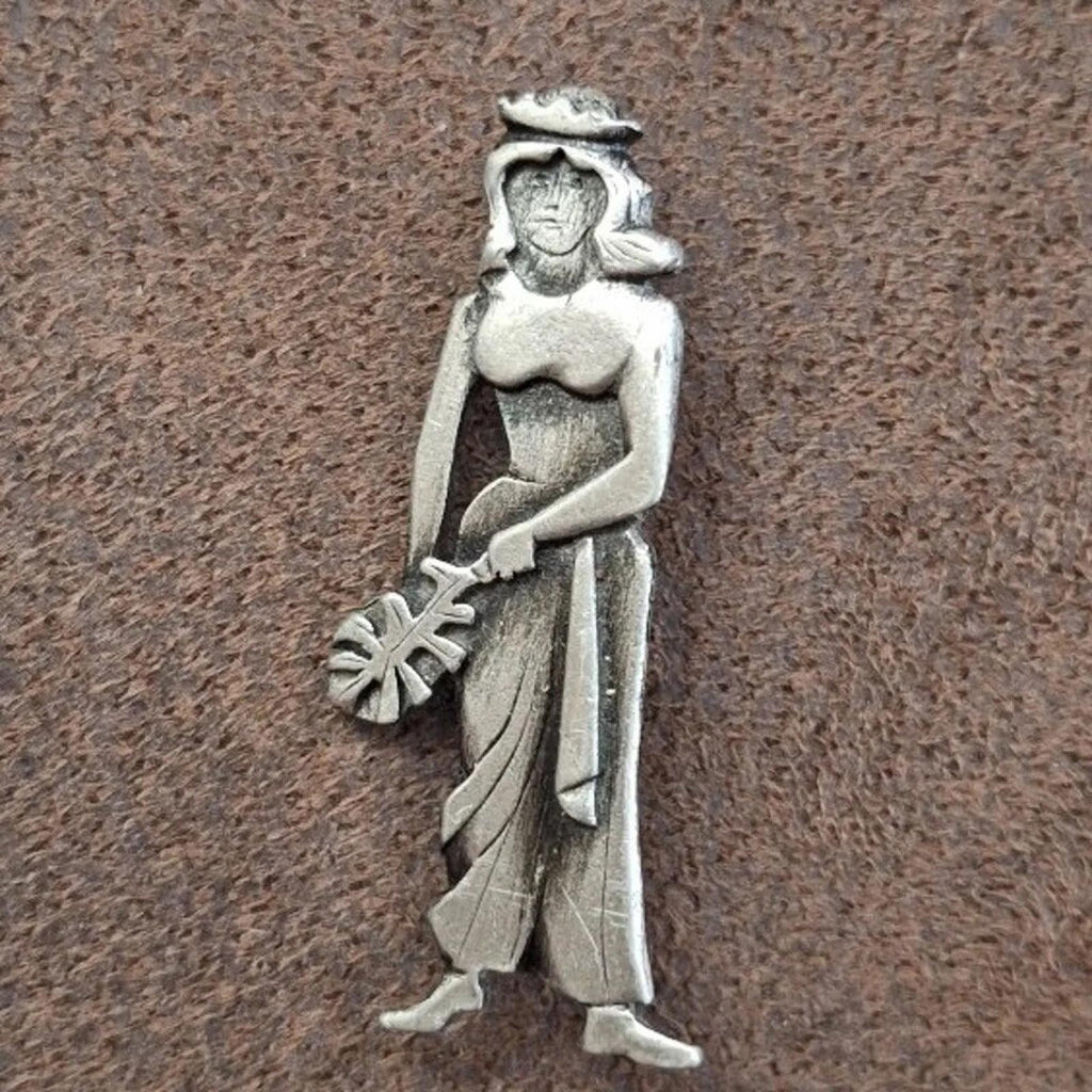 Metzke pewter girl brooch pin, standing figure holding staff, hat with floral top, silver-tone