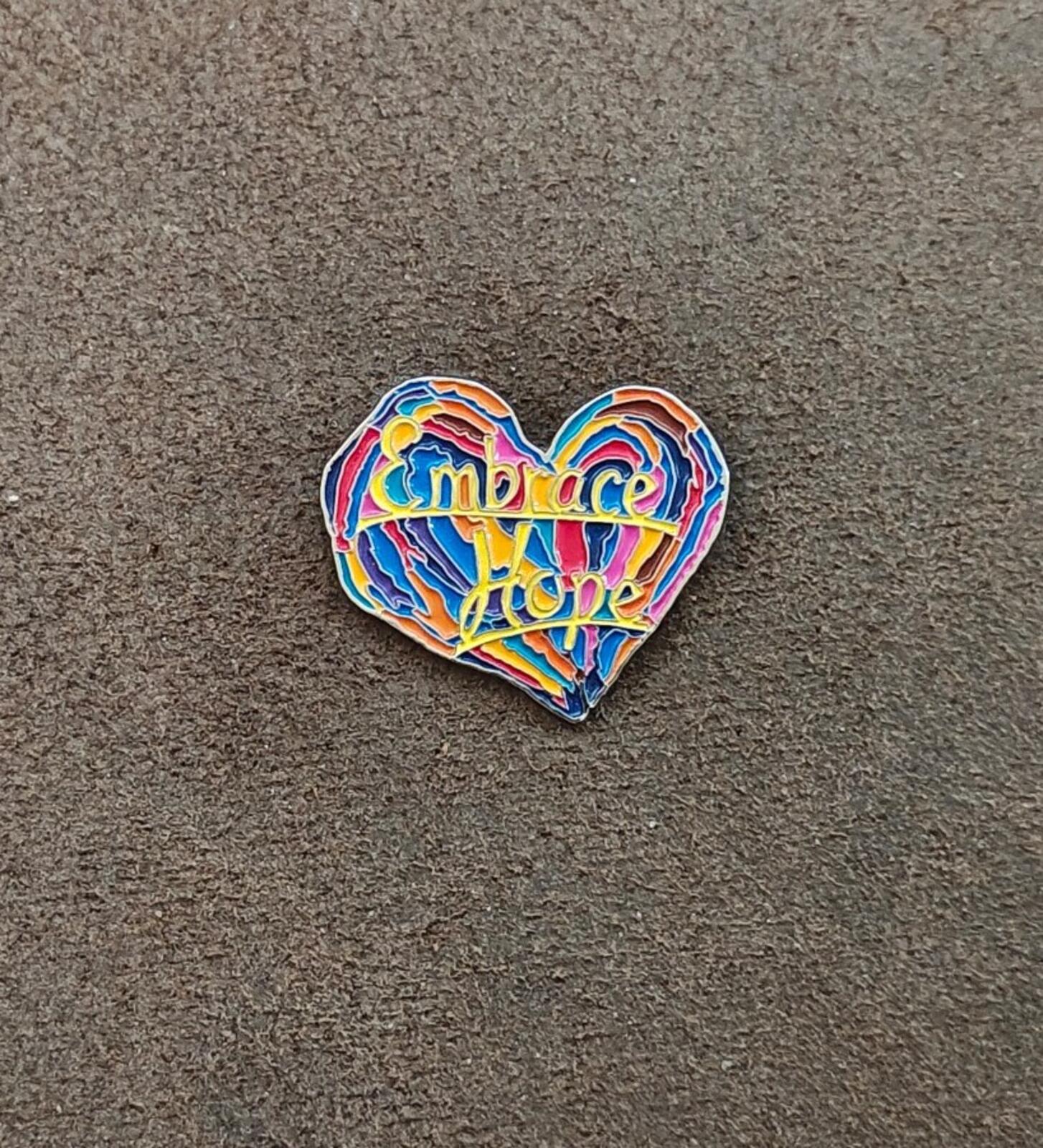 1990s Penzeys Spices Embrace Hope Rainbow Heart Enamel Pin