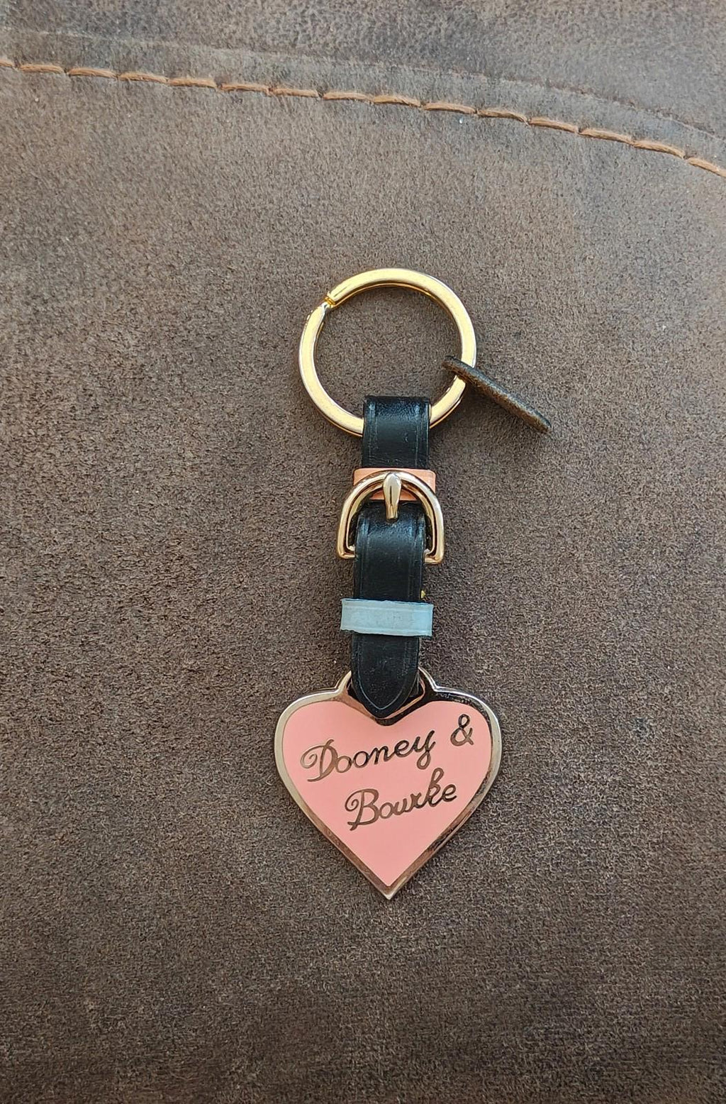 Dooney & Bourke heart keychain fob with gold ring, black strap, light blue tab