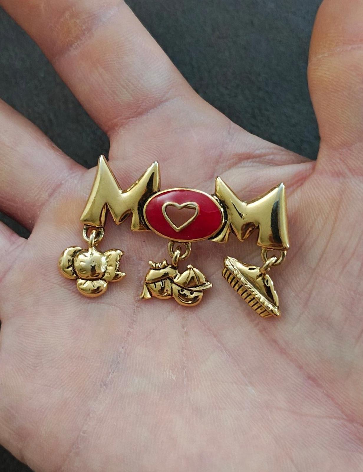 Gold-tone MOM brooch pin with red heart enamel center and cat, heart, shoe-like charms