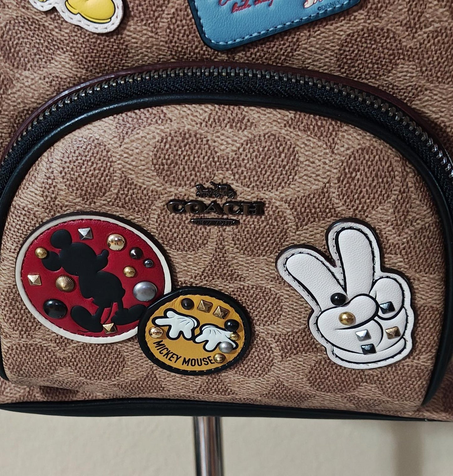 Disney X Coach Carrie Backpack 23 In Signature Canvas With Patches