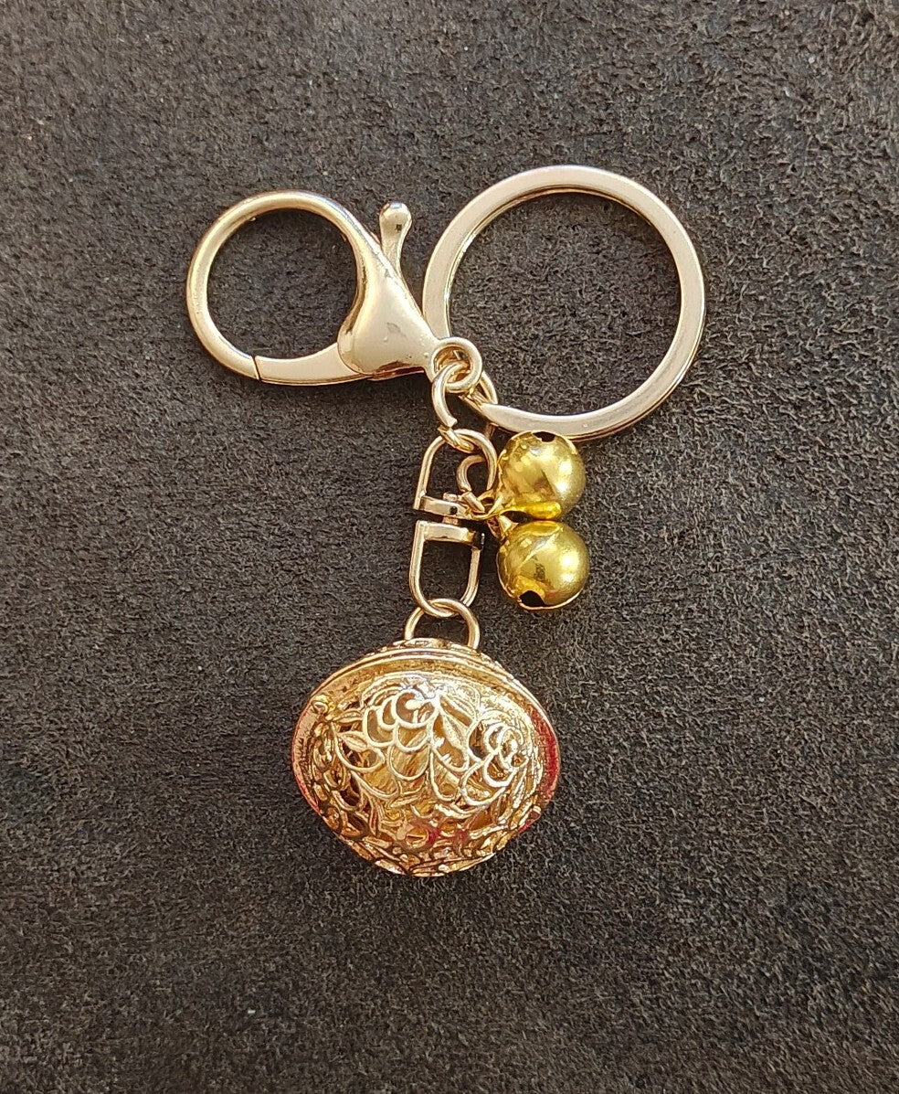 Gold Tone Filigree Chime Ball Keychain