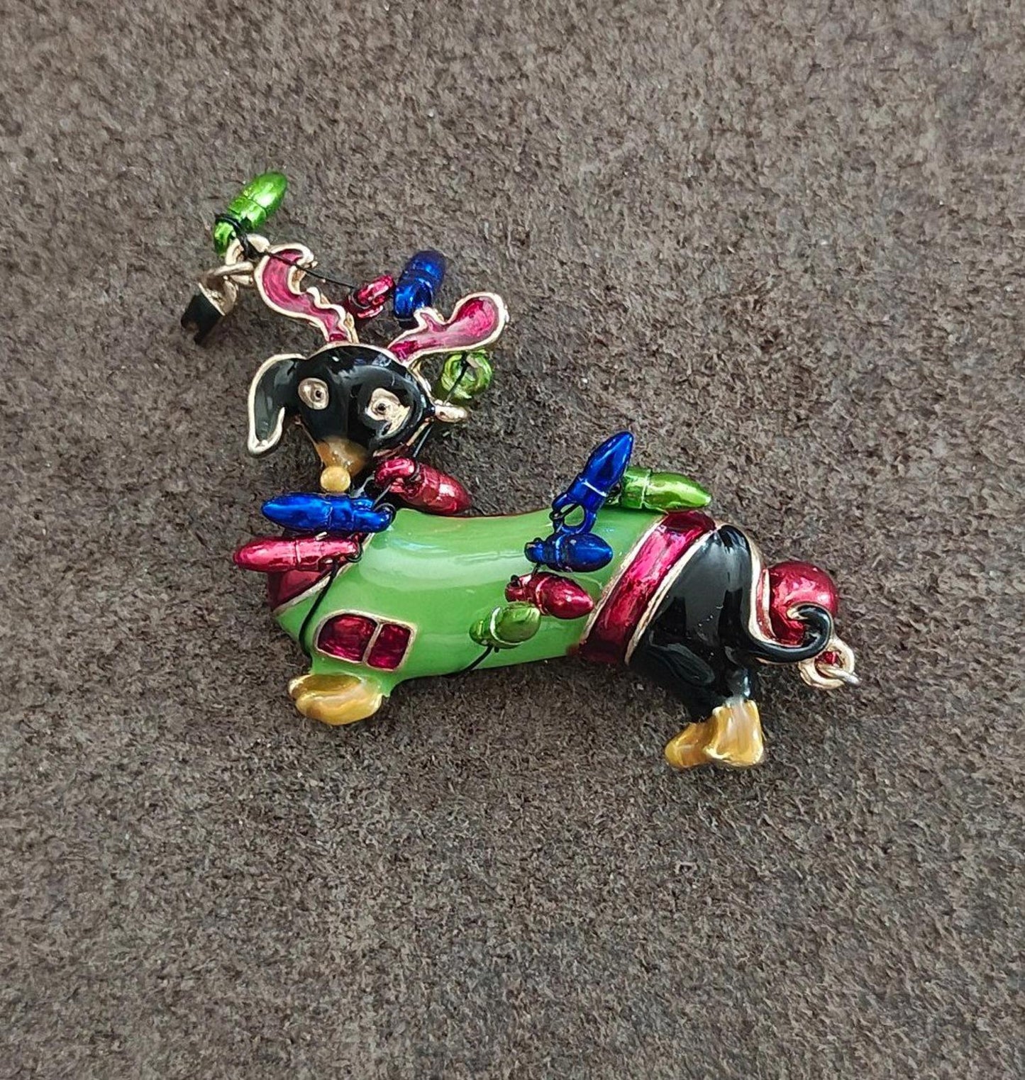 Dachshund Dog Wearing Reindeer Antlers and Wrapped In Colorful Lights Brooch