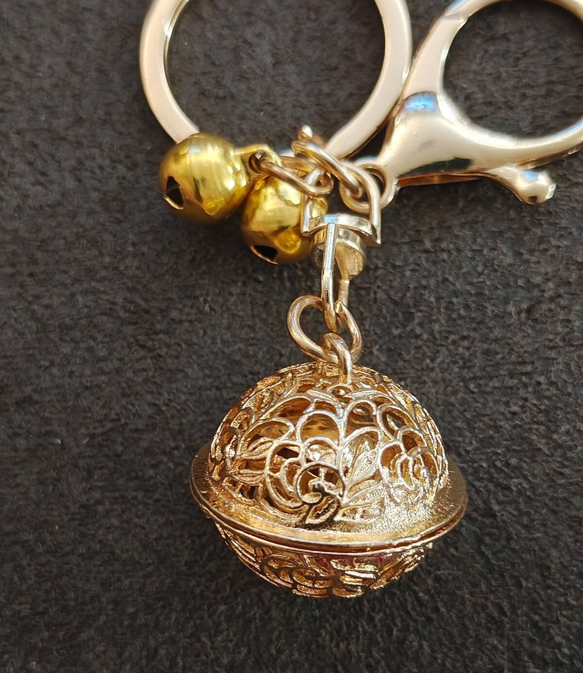 Gold Tone Filigree Chime Ball Keychain