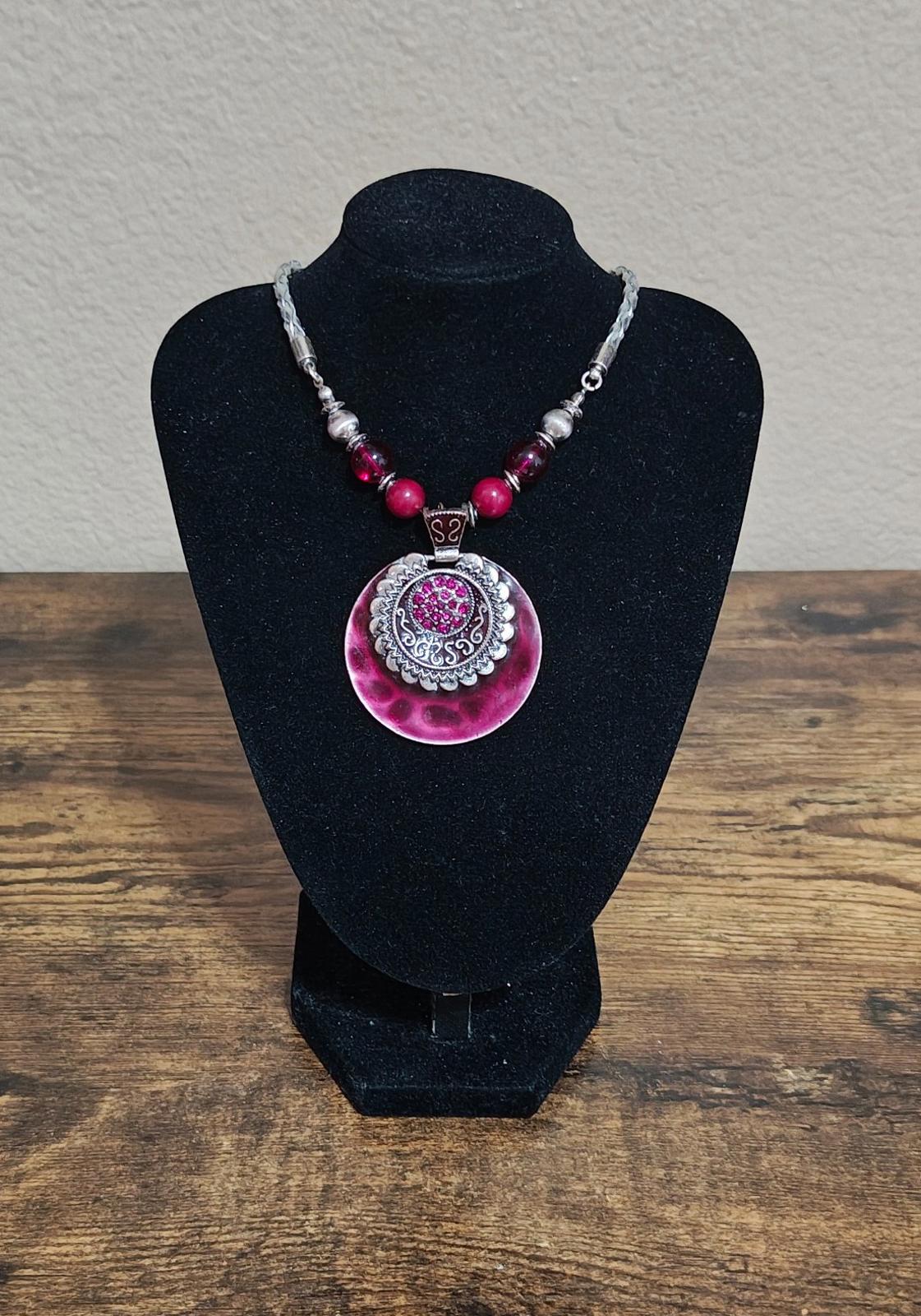 Silver Tone Braided Plastic Chain With Round Burgundy Pendant and Beaded Accents