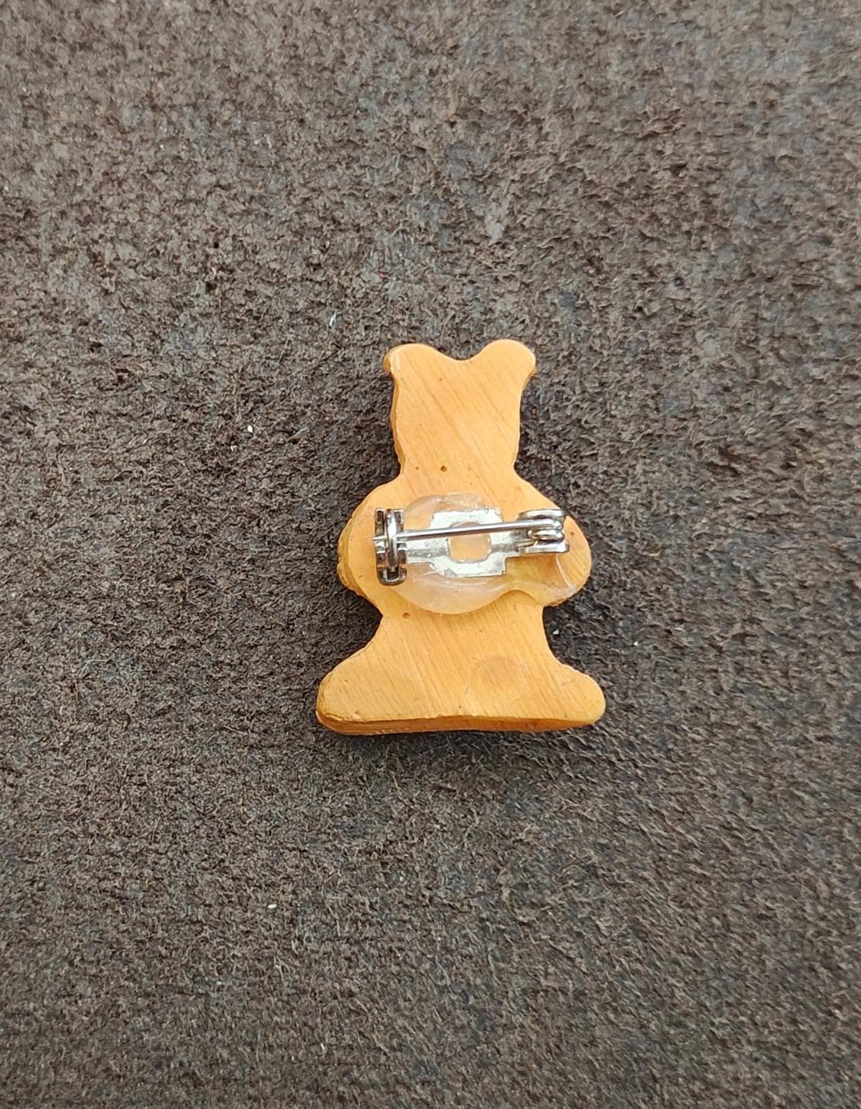 1980s Handpainted Textured Cat Holding a Christmas Present Brooch