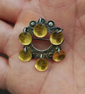 Norwegian brooch with dark silver filigree and dangling gold-toned discs