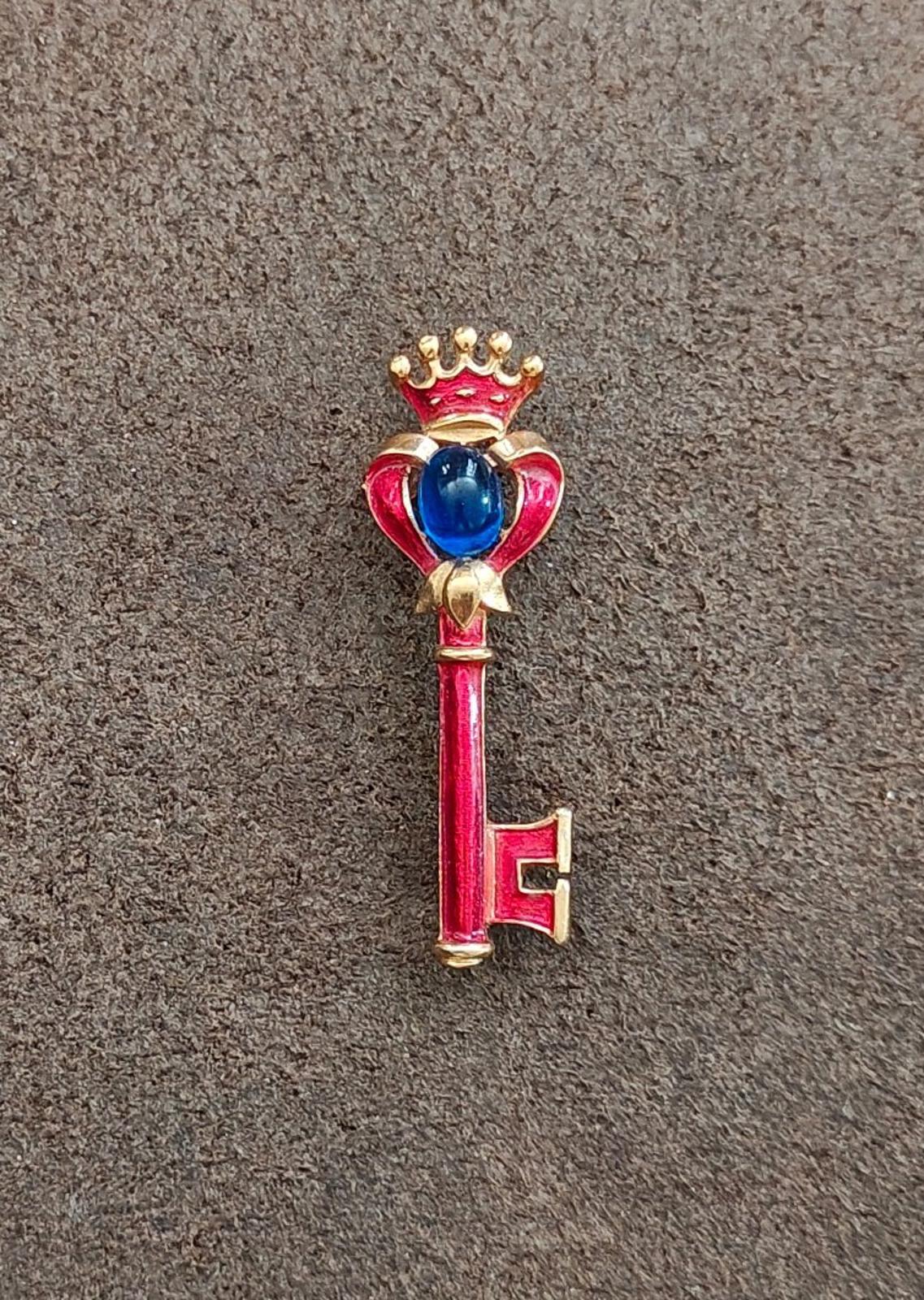 1940s/50s Crown Trifari Gold Tone Key Brooch With Red Enamel and Blue Cabochon
