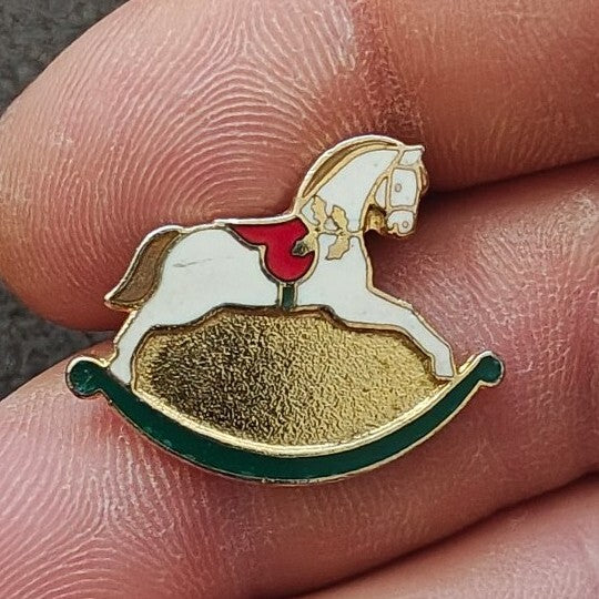1989 Hallmark Rocking Horse Gold Tone With White, Red & Green Enamel Pin