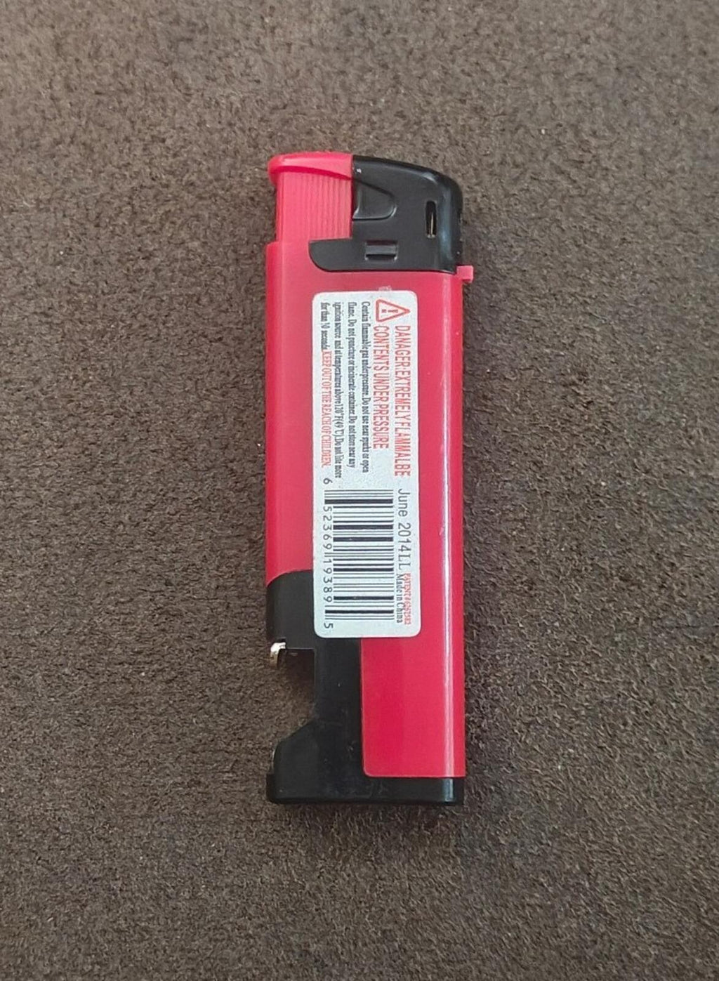 Pink Las Vegas refillable bottle-opener lighter, back with barcode and warning label