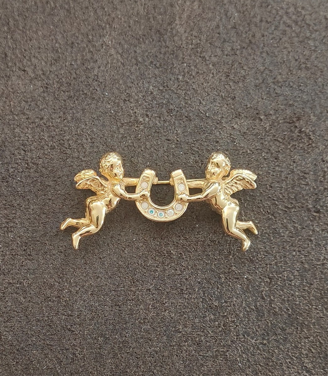 1980s Unsigned Kirks Folly Gold Tone Cherub & Lucky Horseshoe Brooch Pin