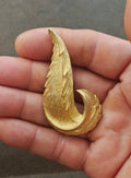 1960s Gold Tone Textured Feather Swirl Brooch