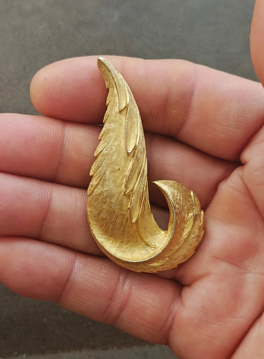 1960s Gold Tone Textured Feather Swirl Brooch