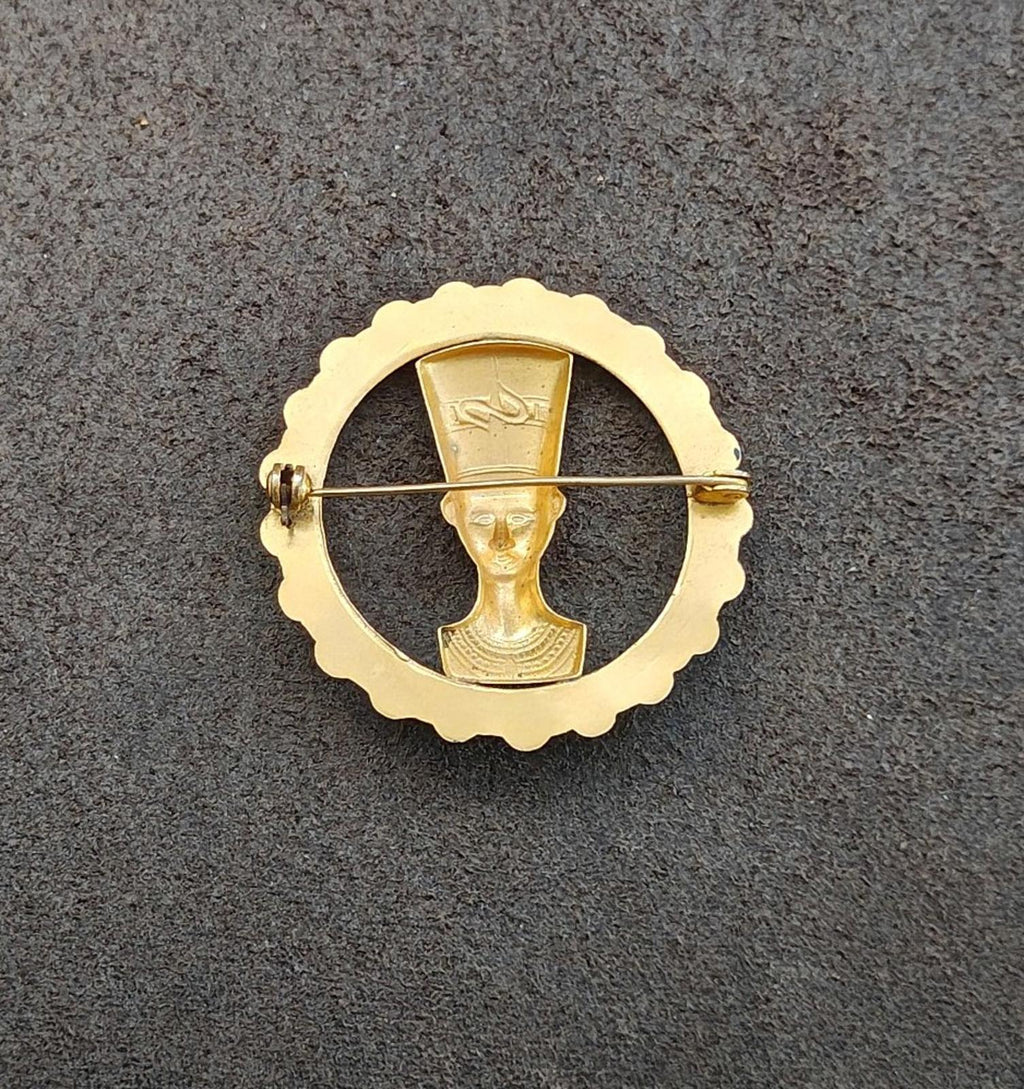 Gold-tone round brooch back with pin and clasp, circular frame design