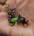 Green dachshund dog enamel brooch with colorful reindeer antlers and lights