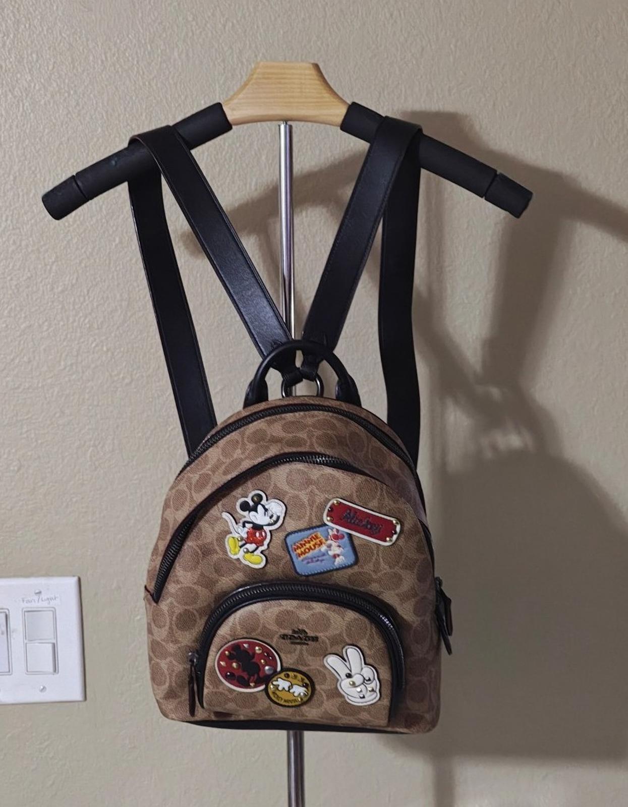 Disney X Coach Carrie Backpack 23 In Signature Canvas With Patches