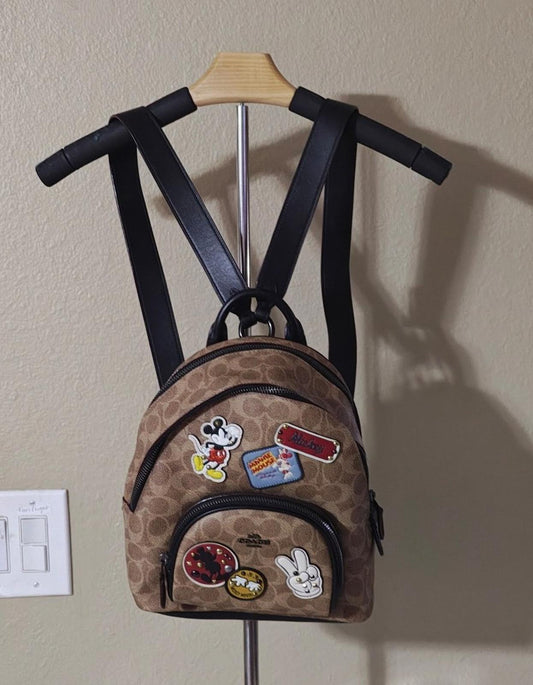 Disney X Coach Carrie Backpack 23 In Signature Canvas With Patches