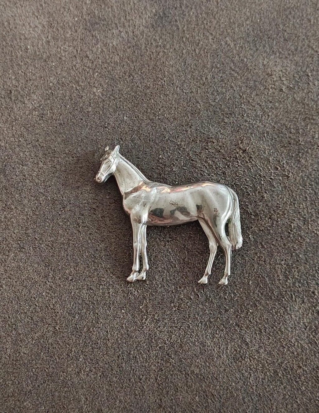 Silver-tone horse brooch, standing horse design with raised mane detail