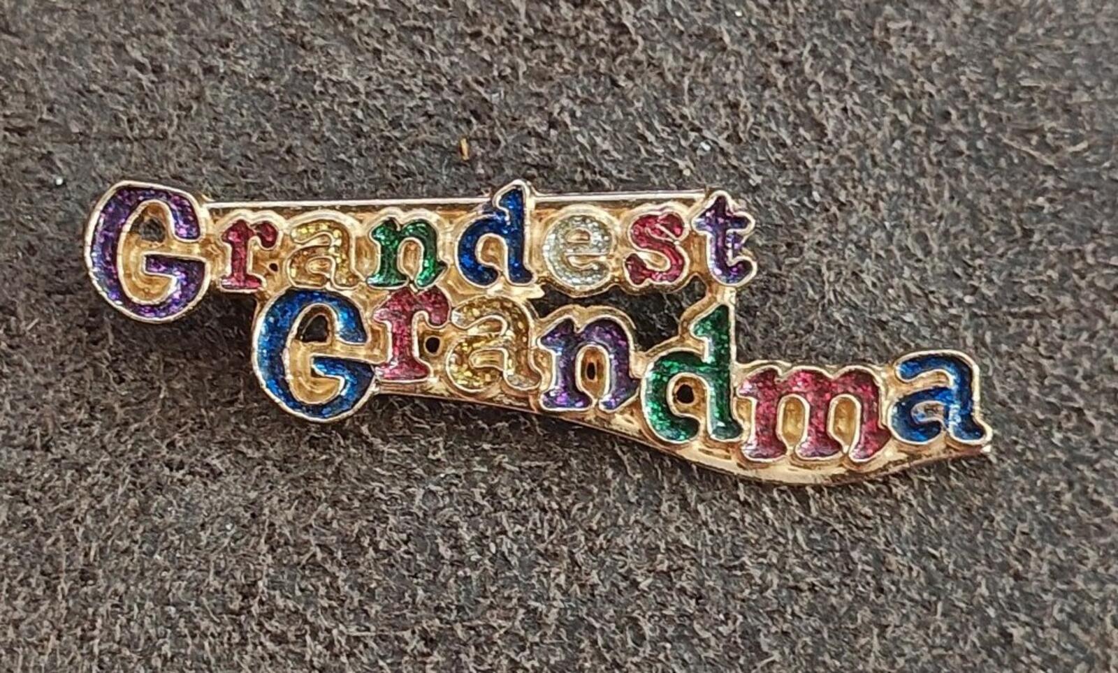 Grandma enamel brooch with 'Grandest Grandma' text, blue green and gold enamel accents