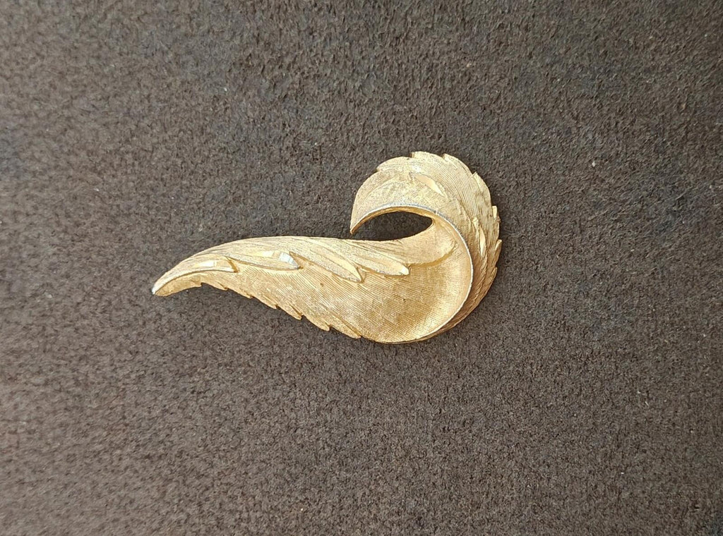 1960s Gold Tone Textured Feather Swirl Brooch
