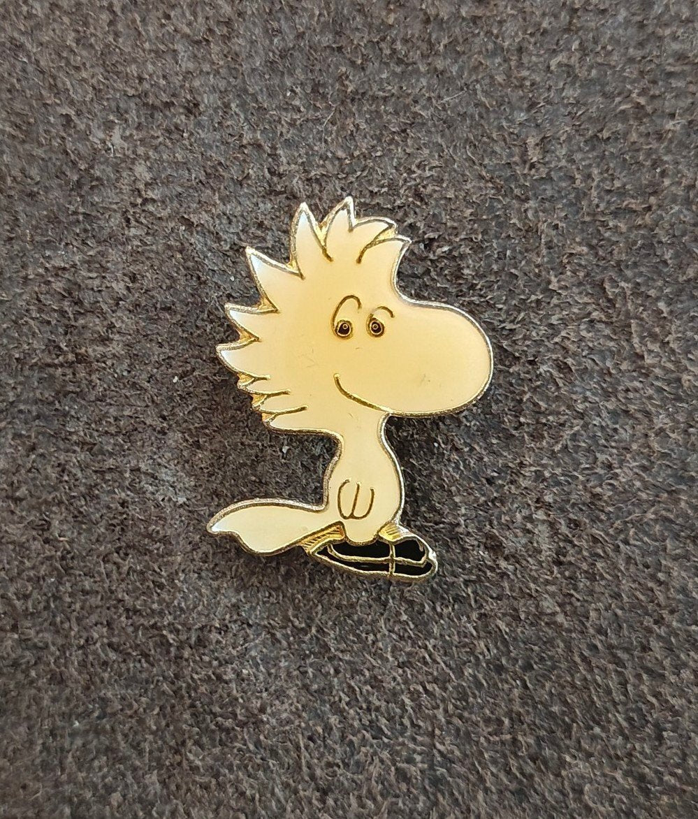 1970s Peanuts Woodstock Wearing Ice Skates Gold Tone Enamel Pin