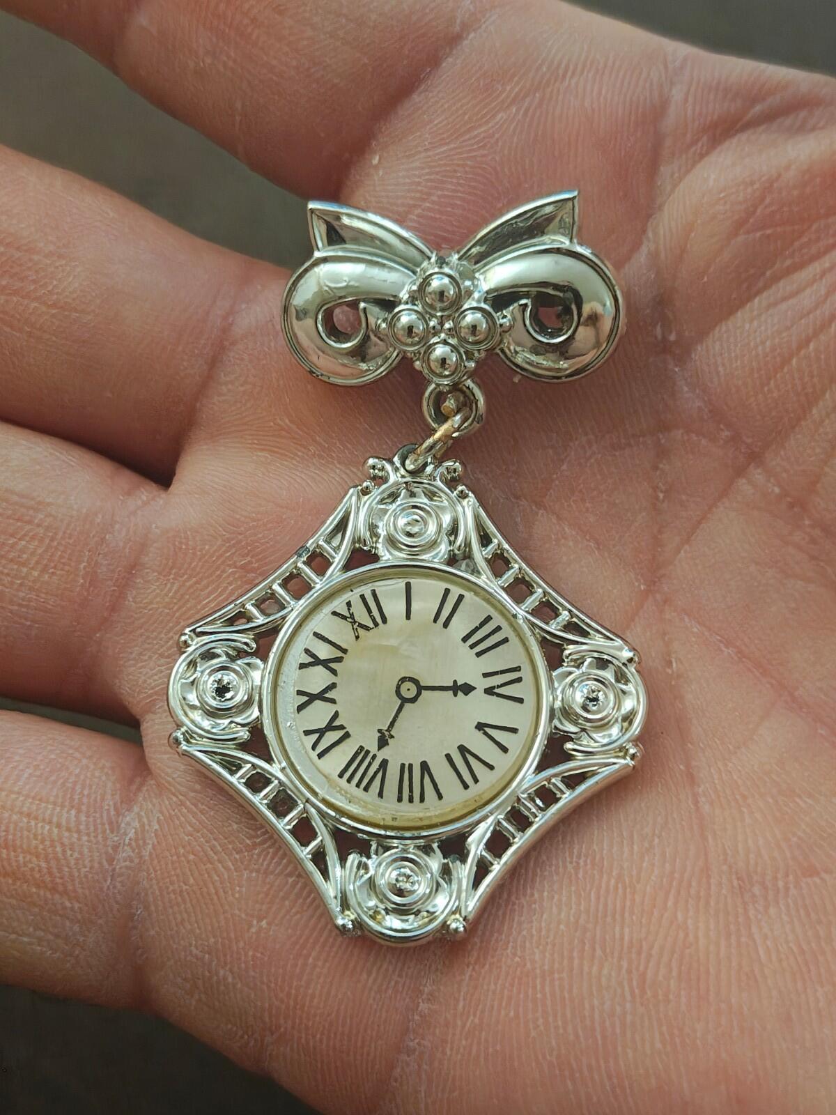 1980s Silver Tone Art Deco Style Bow Clock Motif Dangle Brooch