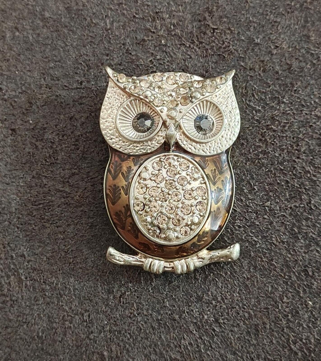 Gold tone owl brooch full front with dark rhinestone eye centers