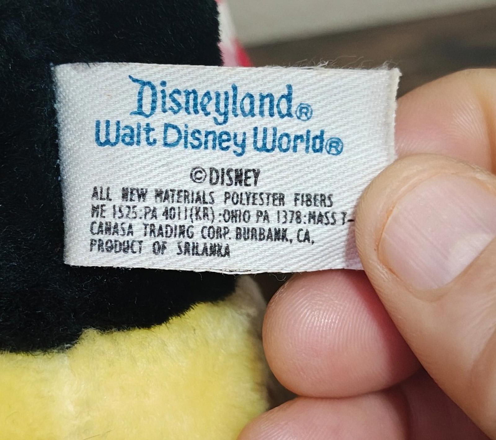 Disneyland Walt Disney World fabric tag on black plush with ©DISNEY