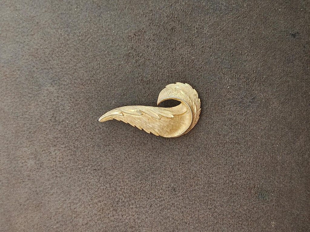 1960s Gold Tone Textured Feather Swirl Brooch