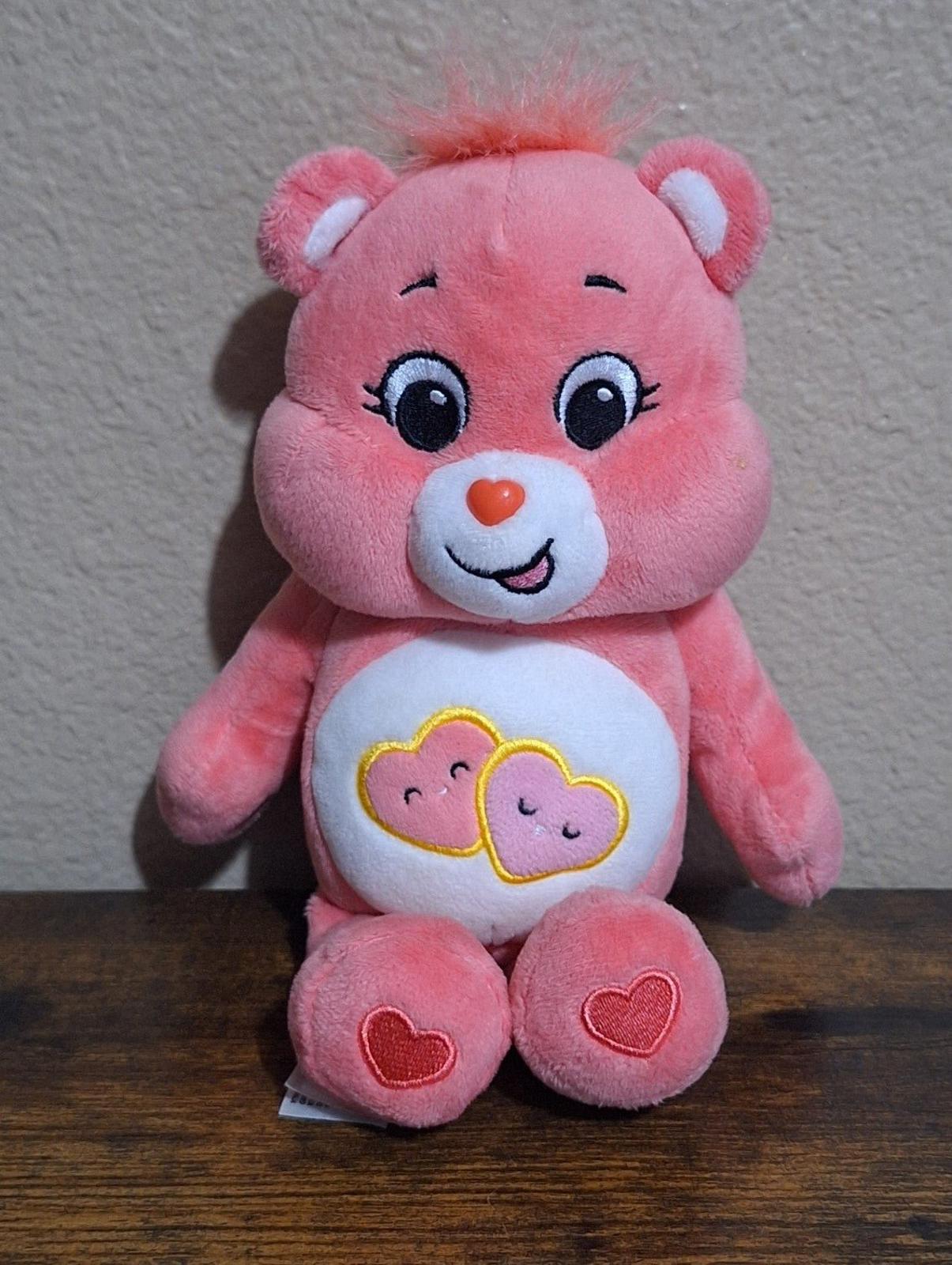 Adorable 2021 Care Bears 10" Love-A-Alot Bear Beanbag Plush.