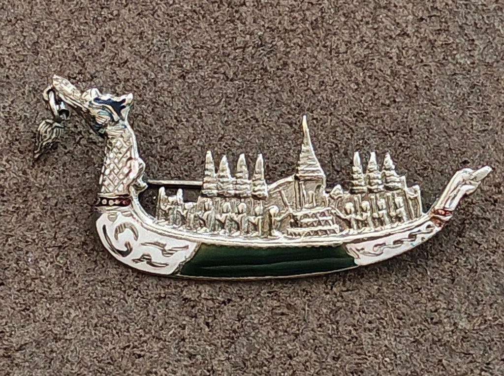 Sterling silver dragon brooch full skyline profile with dark green enamel trough