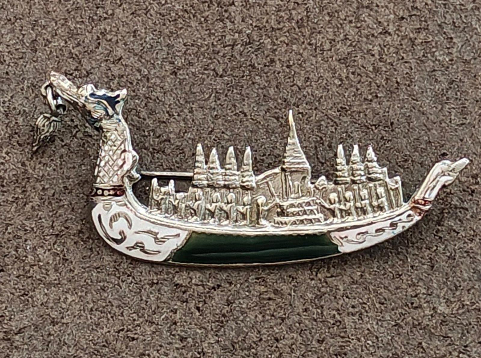 Sterling silver dragon brooch full skyline profile with dark green enamel trough