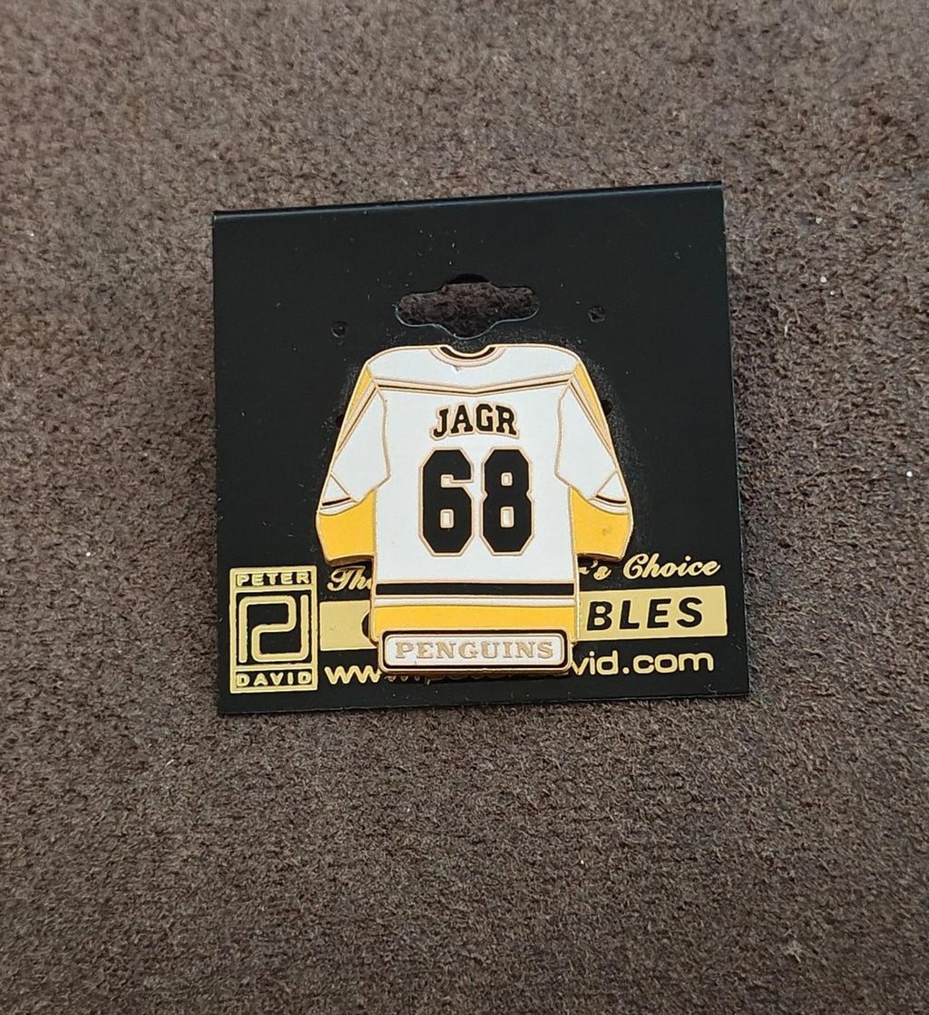 Jagr 68 hockey jersey enamel pin displayed on black card backing
