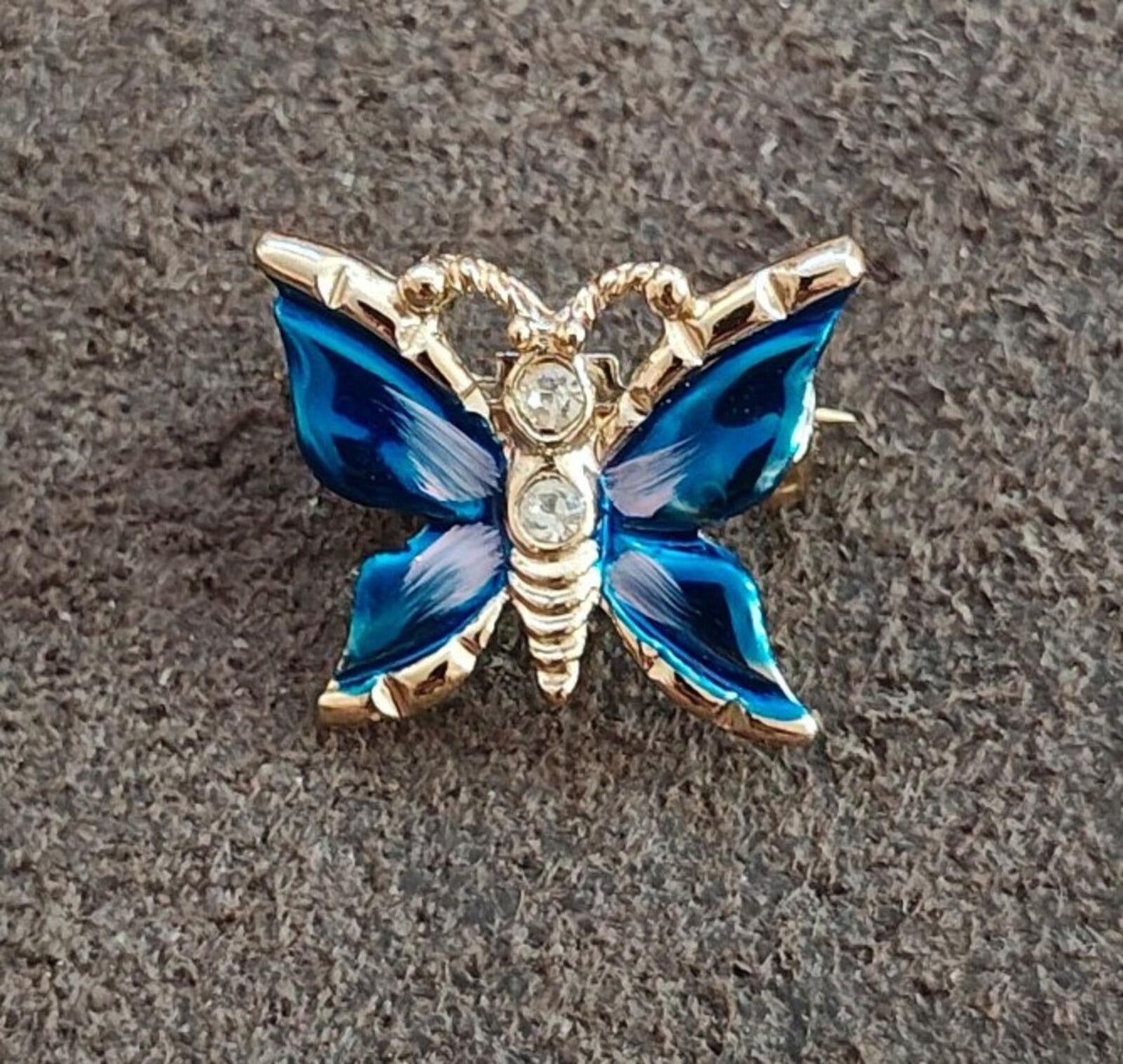 1980s Gold Tone Blue Enamel Butterfly Brooch Accented With Clear Rhinestones