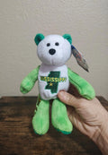 Green and white plush bear with embroidered Mississippi state on front shirt