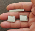 Silver tie bar and cufflinks set with rectangular art-deco pattern on fronts