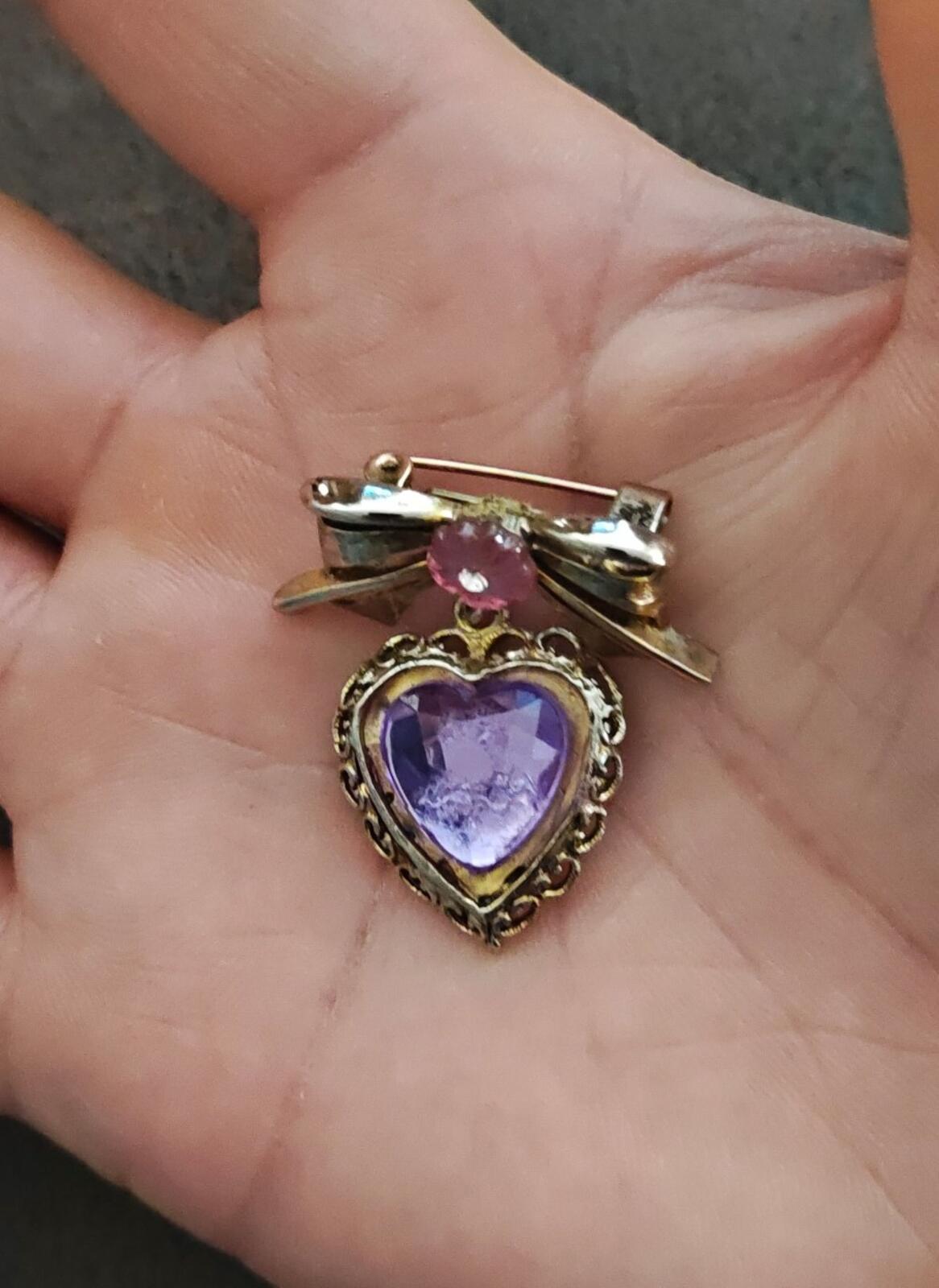 1980s Gold Tone Bow With Pink Flower & Filigree Edged Purple Stone Heart Brooch