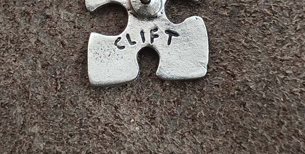 Jim Clift Fine Pewter Puzzle Piece Pin