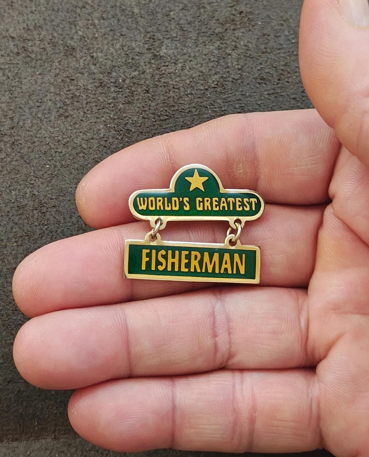 1970s "Worlds Greatest Fisherman Gold Tone Green Enamel Dangle Pin