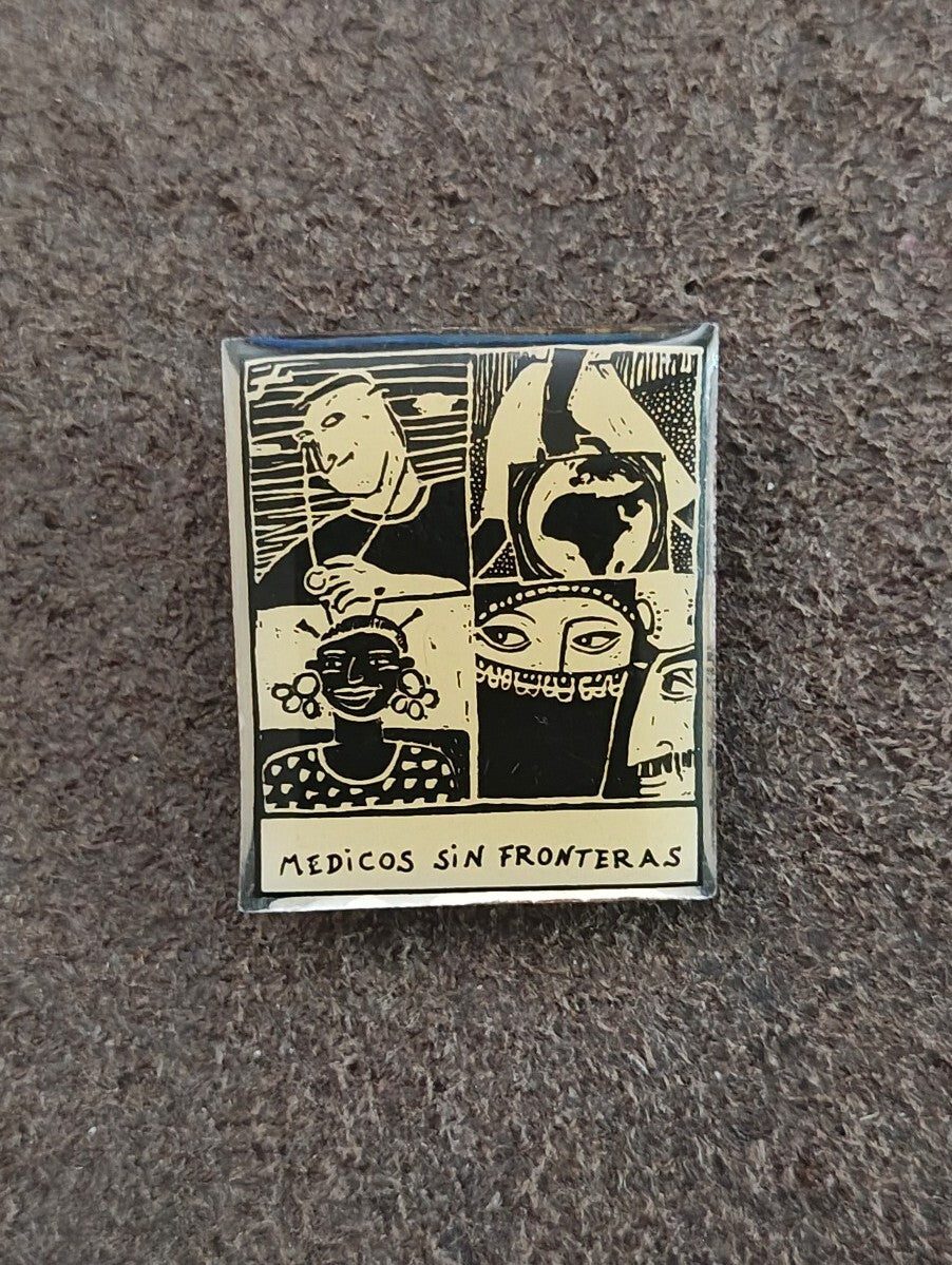 1990s Médicos Sin Fronteras (Doctors Without Borders) Silver Tone Enamel Pin