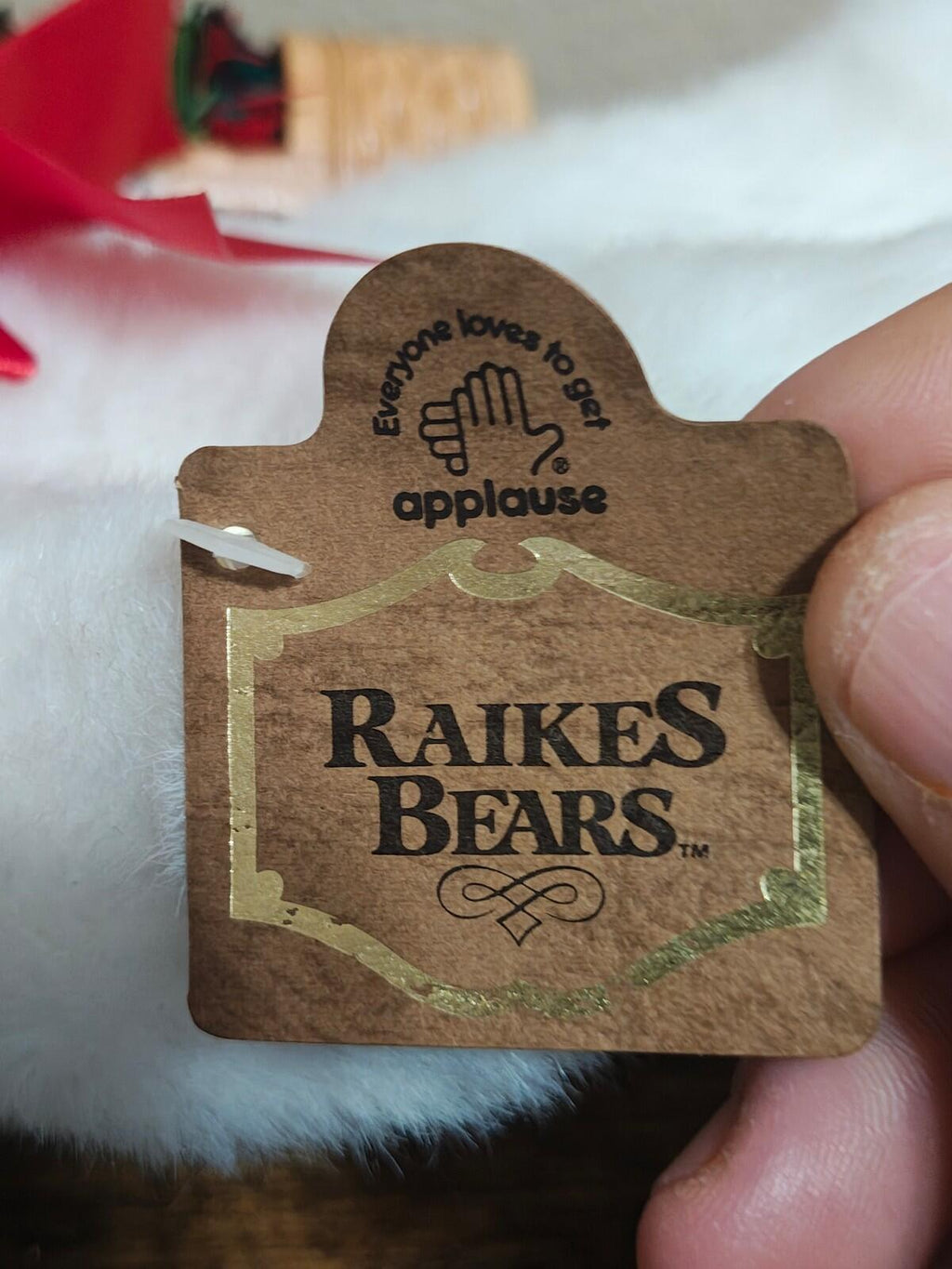 applause RAikes BEARS tag reading 'Ever loves to dance' on plush