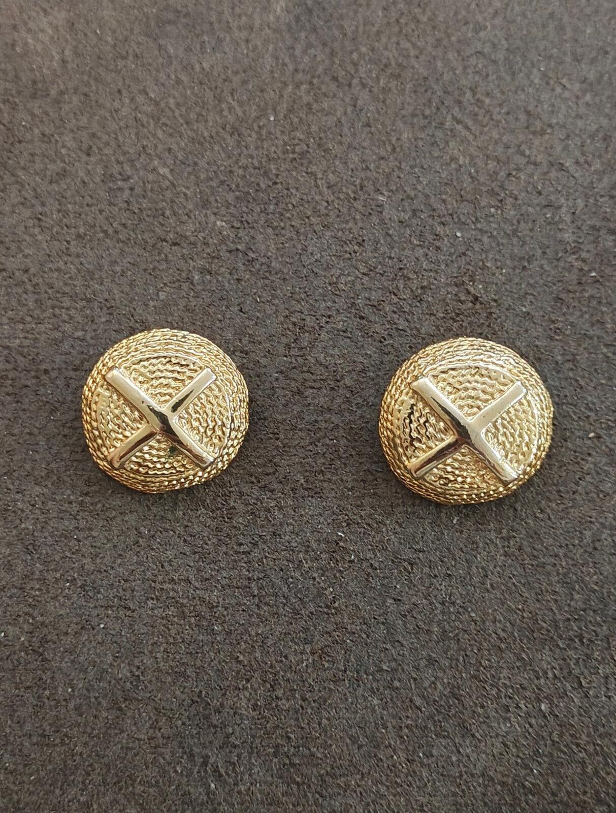 1980s Gold Tone Domed Textured Classic X Design Clip On Earrings