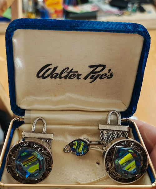 Iridescent gemstone-style cufflinks with tie tack in Walter Pye's blue velvet box