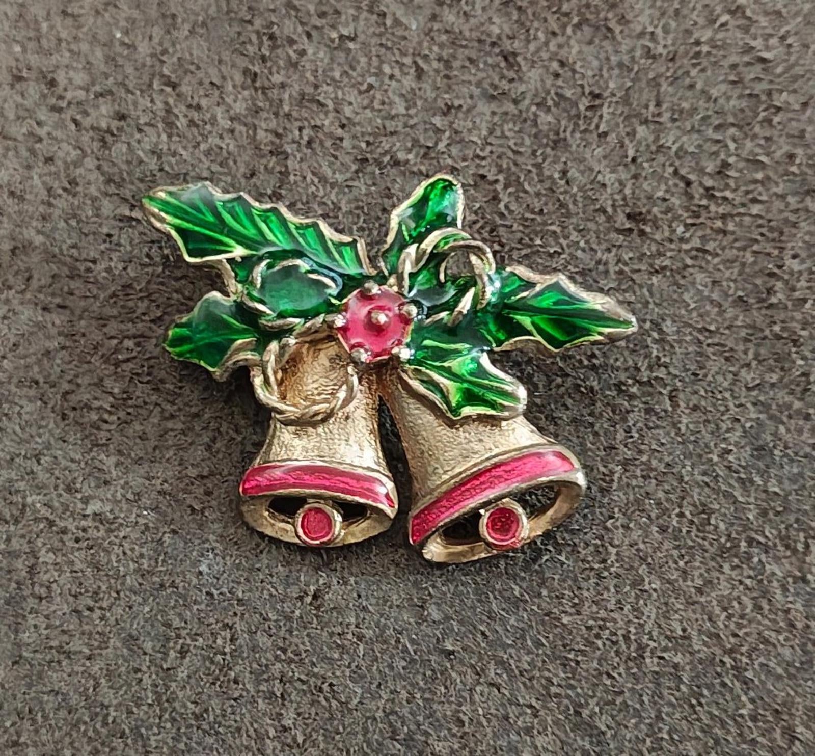 Christmas bell enamel brooch with green leaves, red berries, and two gold-tone bells