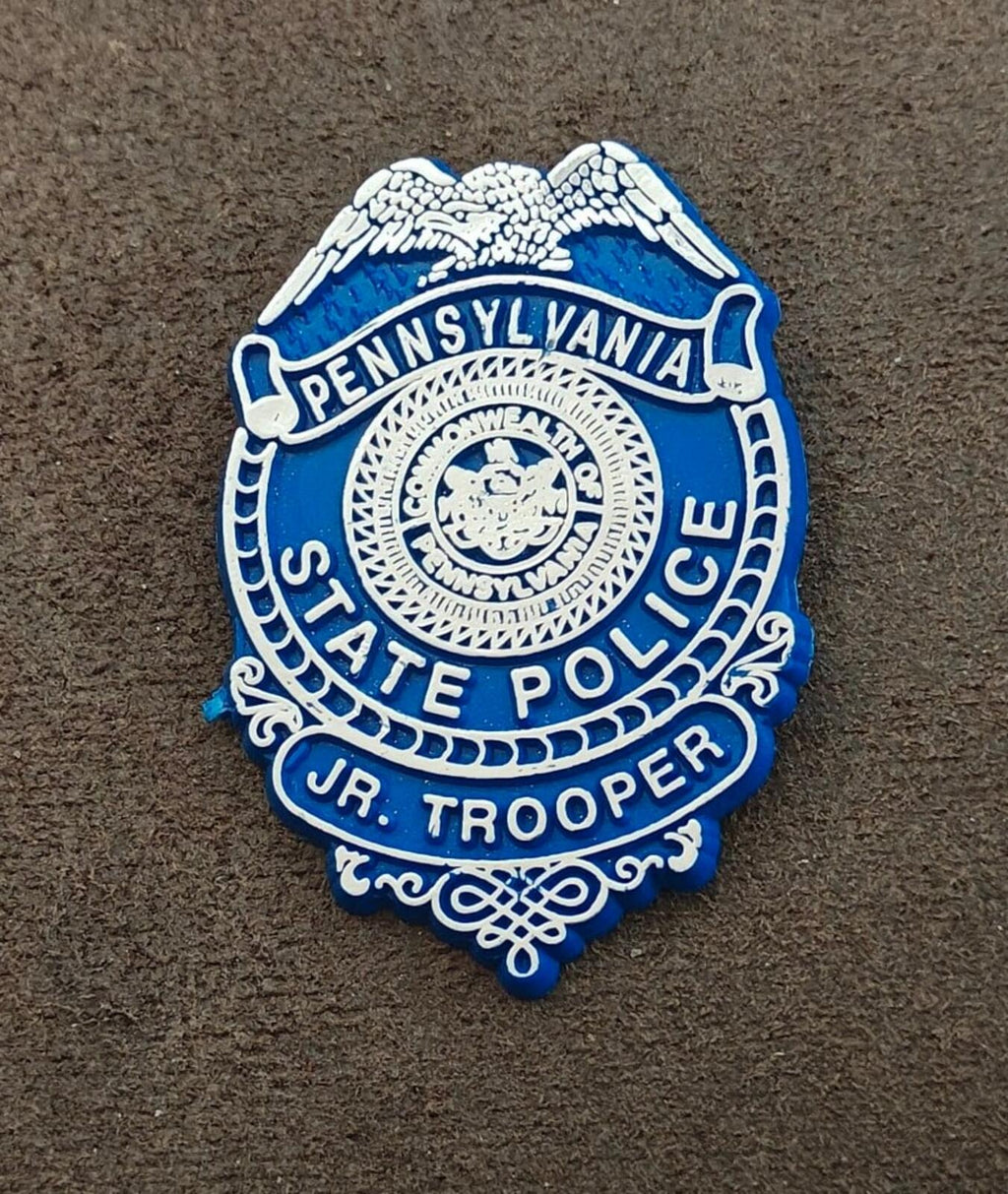 Pennsylvania State Police Jr. Trooper badge, full front crest, blue and white plastic