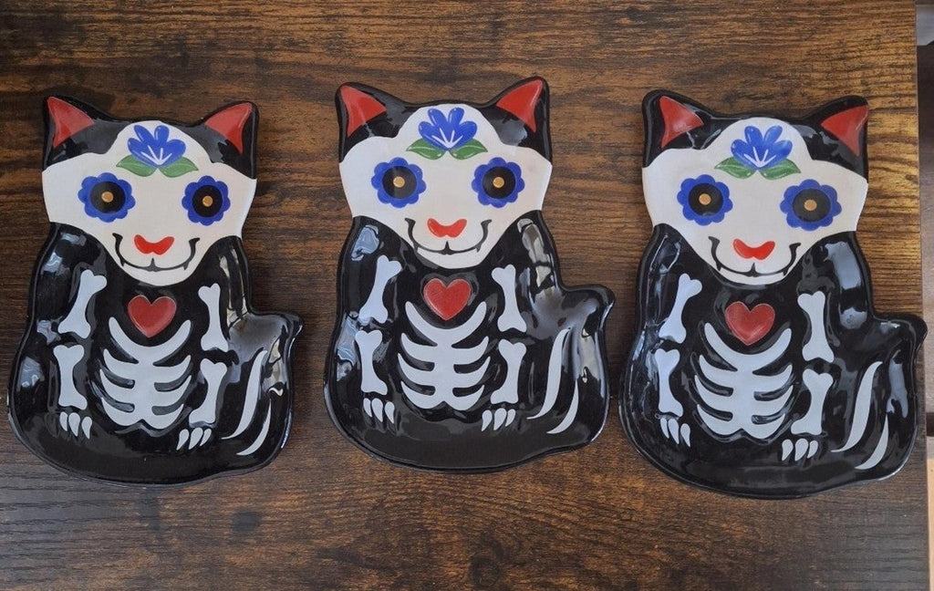 Set of three black 3D cat sugar skull trinket plates with blue and red face details