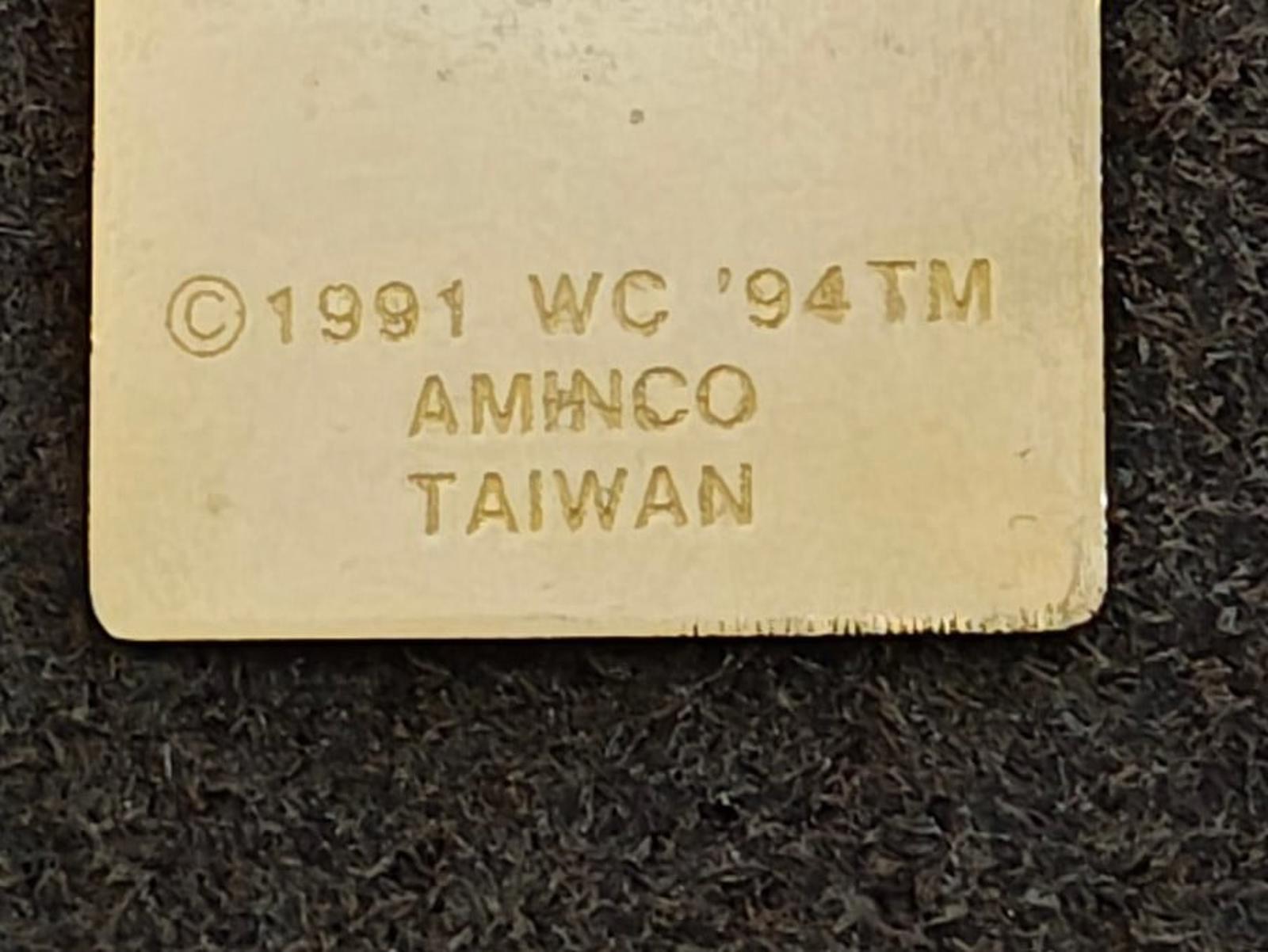 Stamped pin back text: ©1991 WC '94 TM AMANCO TAIWAN